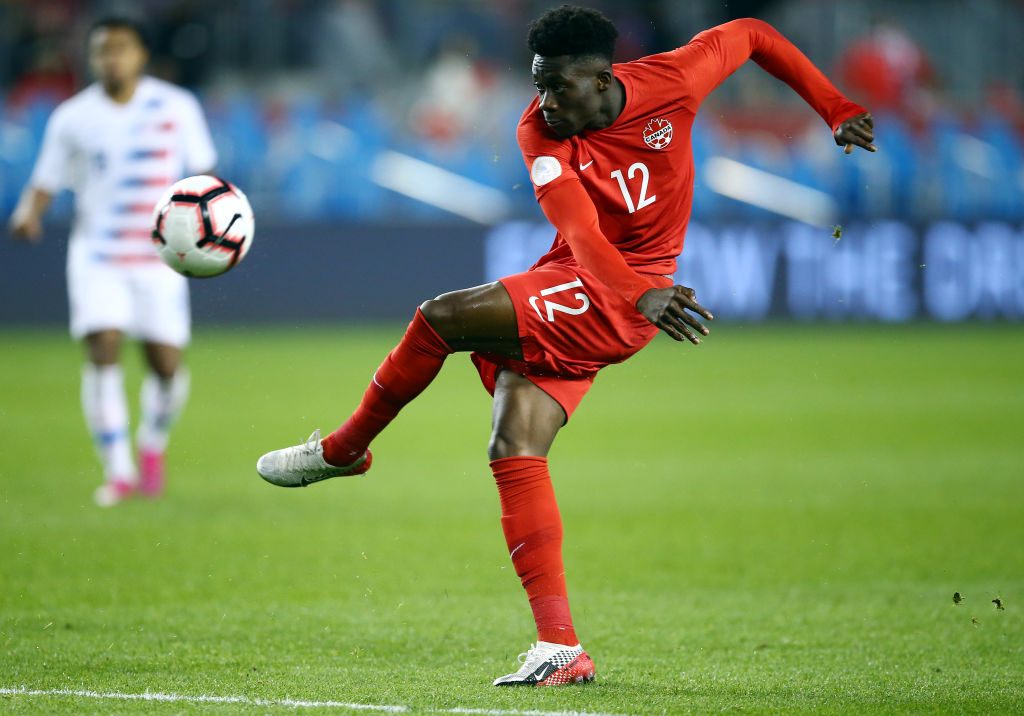 Why is Alphonso Davies not playing for Canada in World Cup qualifying?